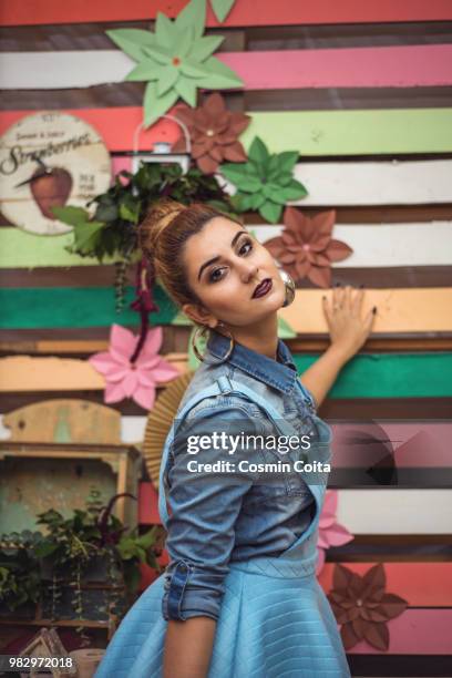 beauty girl portrait with baby blue dress. colorful decor studio shot of fashion woman. vivid colors - fashion studio shot stock pictures, royalty-free photos & images