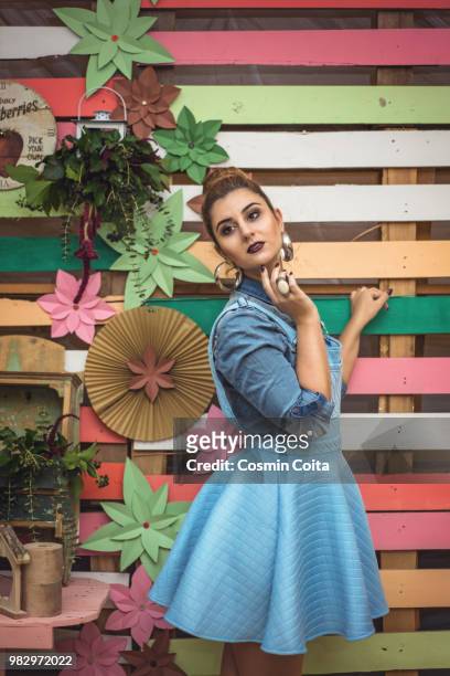 beauty girl portrait with baby blue dress. colorful decor studio shot of fashion woman. vivid colors - fashion studio shot stock pictures, royalty-free photos & images