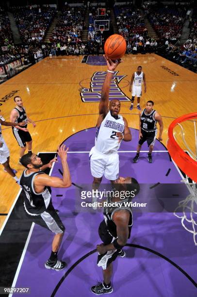 Carl Landry of the Sacramento Kings shoots the ball over Antonio McDyess of the San Antonio Spurs on April 6, 2010 at ARCO Arena in Sacramento,...
