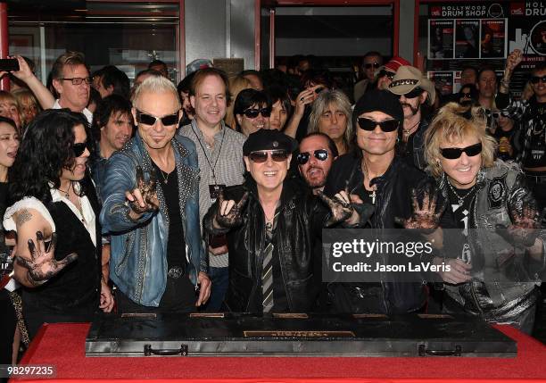 Pawel Maciwoda, Rudolf Schenker, Klaus Meine, Matthias Jabs, James Kottak of The Scorpions are inducted into the Hollywood RockWalk on April 6, 2010...