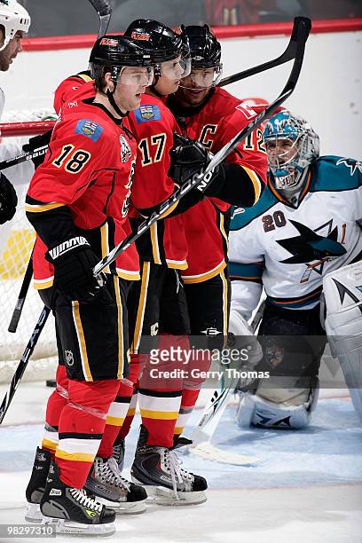 Matt Stajan, Rene Bourque and Jarome Iginla of the Calgary Flames celebrate a goal against the San Jose Sharks on April 6, 2010 at Pengrowth...
