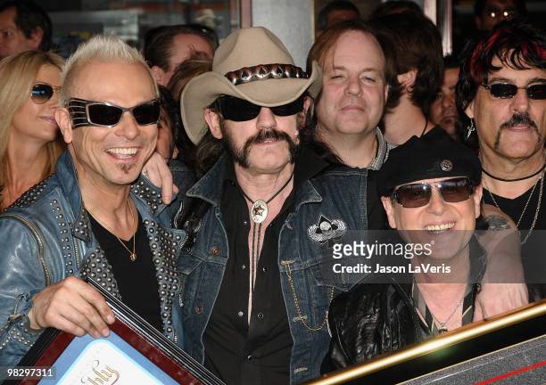 Rudolf Schenker, Lemmy Kilmister and Klaus Meine attend The Scorpions' induction into the Hollywood RockWalk on April 6, 2010 in Hollywood,...