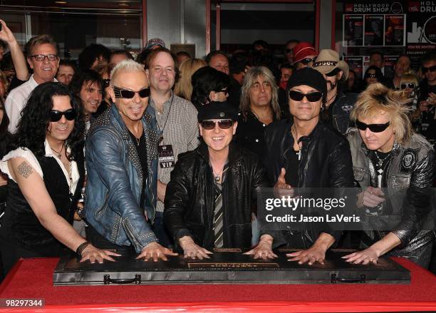 Pawel Maciwoda, Rudolf Schenker, Klaus Meine, Matthias Jabs, James Kottak of The Scorpions are inducted into the Hollywood RockWalk on April 6, 2010...