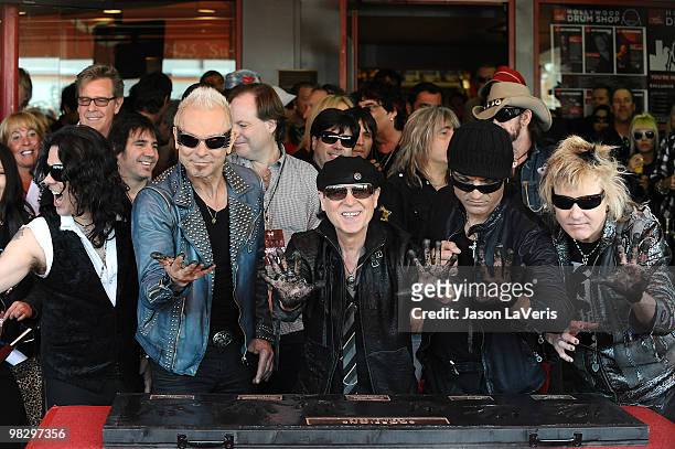 Pawel Maciwoda, Rudolf Schenker, Klaus Meine, Matthias Jabs, James Kottak of The Scorpions are inducted into the Hollywood RockWalk on April 6, 2010...