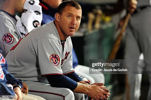 Jim Thome of the Minnesota Twins sits in the dugout as they play against the Los Angeles Angels of Anaheim on April 6, 2010 at the Angel Stadium of...