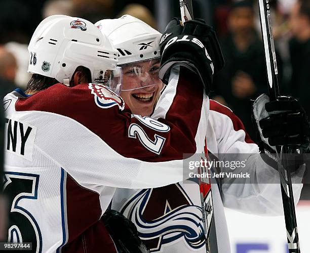 Matt Duchene of the Colorado Avalanche celebrates with teammate Paul Stastny after scoring in the shootout during their game against the Vancouver...