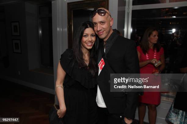 Irina Shabayeva and Robert Verdi attend a book launch for "LuLu Powers: Food to Flowers" sponsored by Tupperware at the Home of Donya Bommer on April...