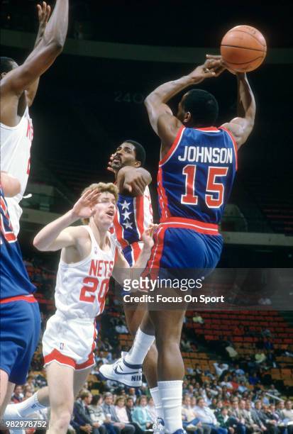 Vinnie Johnson of the Detroit Pistons in action against the New Jersey Nets during an NBA basketball game circa 1986 at the Brendan Byrne Arena in...