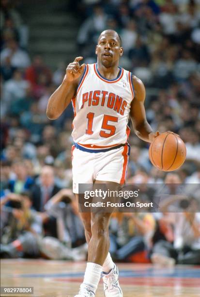 Vinnie Johnson of the Detroit Pistons dribbles the ball during an NBA basketball game circa 1988 at The Palace of Auburn Hills in Auburn Hills,...