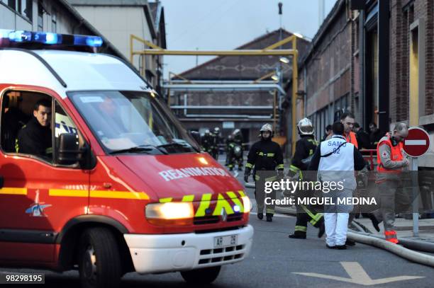 Firemen work on April 07, 2010 in Gennevilliers outside Paris, in the factory where a fire and an explosion killed one person and injured 12 others,...