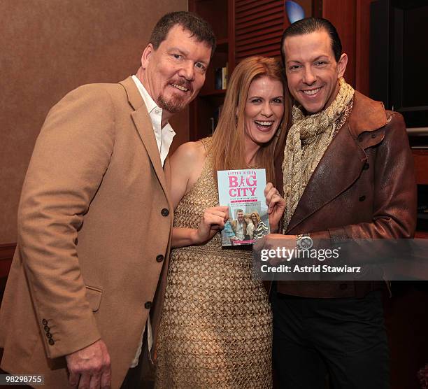 Simon Van Kempen, Alex McCord and Derek Warburton pose for photos at the book launch for Alex McCord & Simon Van Kempen's "Little Kids, Big City:...