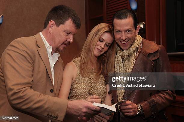 Simon Van Kempen, Alex McCord and Derek Warburton pose for photos at the book launch for Alex McCord & Simon Van Kempen's "Little Kids, Big City:...