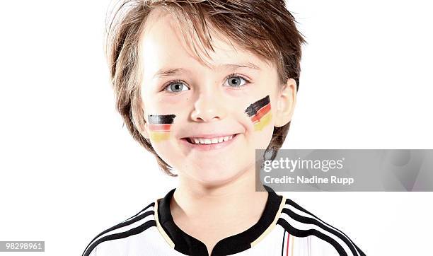 Germany fan child Aurele Rupp poses in the original german national trikot during a photo session on March 6, 2010 in Bocholt, Germany.