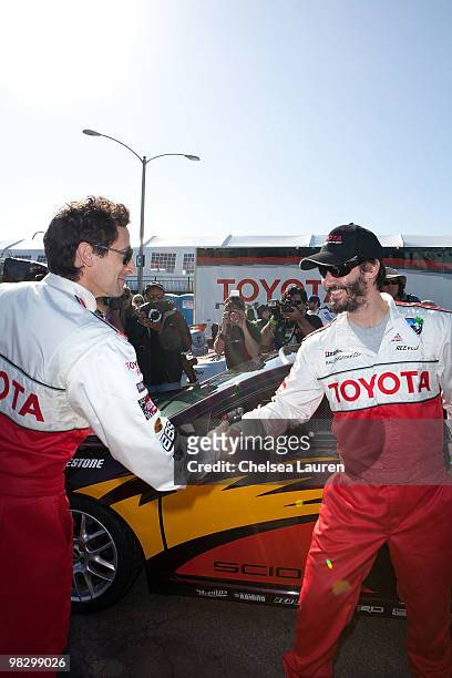 Actors Adrien Brody and Keanu Reeves attend the Toyota Pro Celebrity Race press day on April 6, 2010 in Long Beach, California.