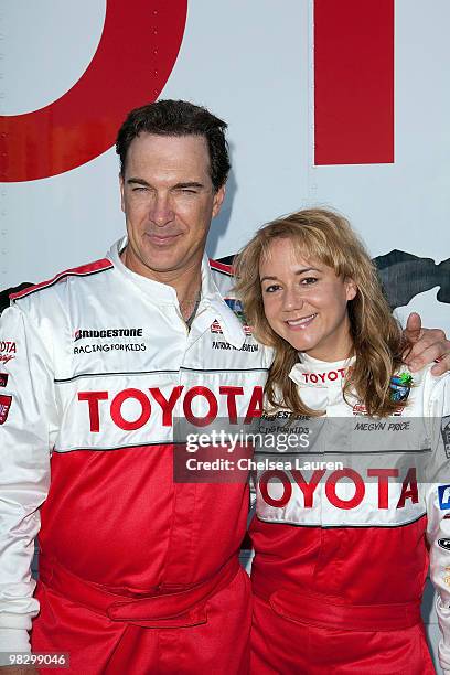 Actors Patrick Warburton and Megyn Price attend the Toyota Pro Celebrity Race press day on April 6, 2010 in Long Beach, California.