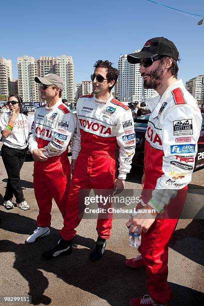 Actors Christian Slater, Adrien Brody and Keanu Reeves attend the Toyota Pro Celebrity Race press day on April 6, 2010 in Long Beach, California.