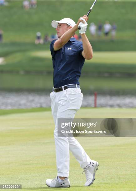 Jordan Spieth takes a shot from the fairway during the Final Round of the Travelers Championship on June 24, 2018 at TPC River Highlands in Cromwell,...