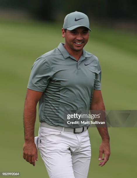 Jason Day of Australia watches his second shot on the third hole during the final round of the Travelers Championship at TPC River Highlands on June...