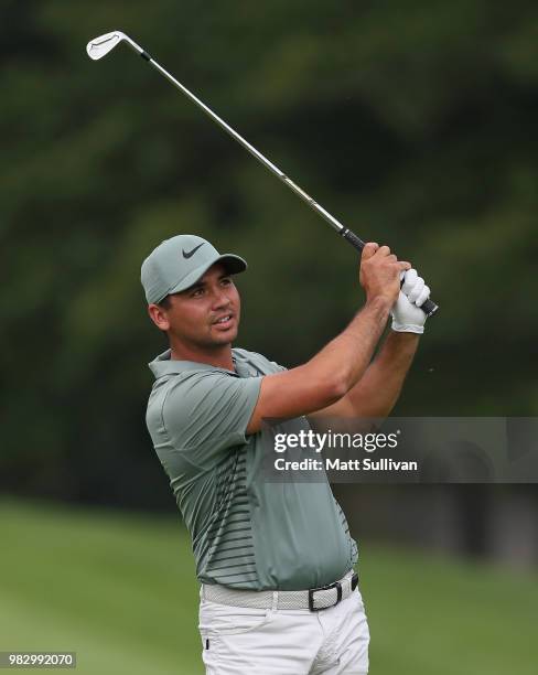 Jason Day of Australia watches his second shot on the third hole during the final round of the Travelers Championship at TPC River Highlands on June...