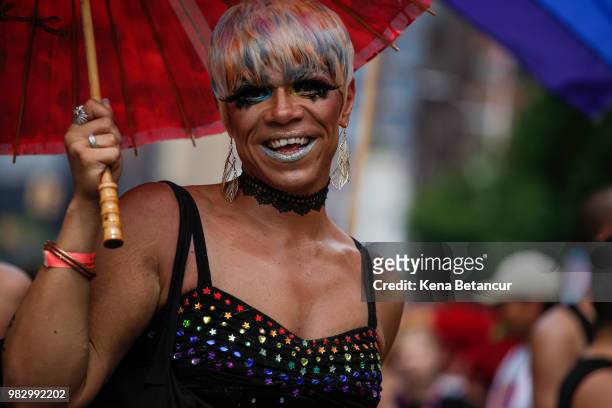 Reveller attends the annual Pride Parade on June 24, 2018 in New York City. The first gay pride parade in the U.S. Was held in Central Park on June...