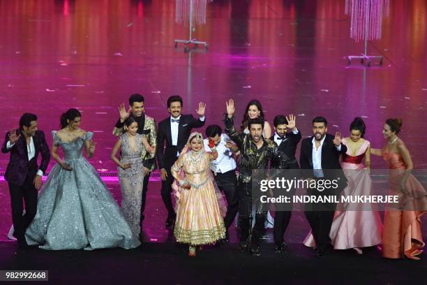 Bollywood actress Rekha performs with other actors and actresses at the closing of the IIFA Awards of the 19th International Indian Film Academy...
