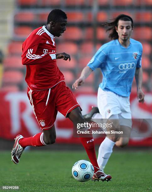 Saer Sene of Bayern and Markus Karl of Ingolstadt fight vor the ball during the 3rd League match FC Bayern Muenchen II vs FC Ingolstadt at...