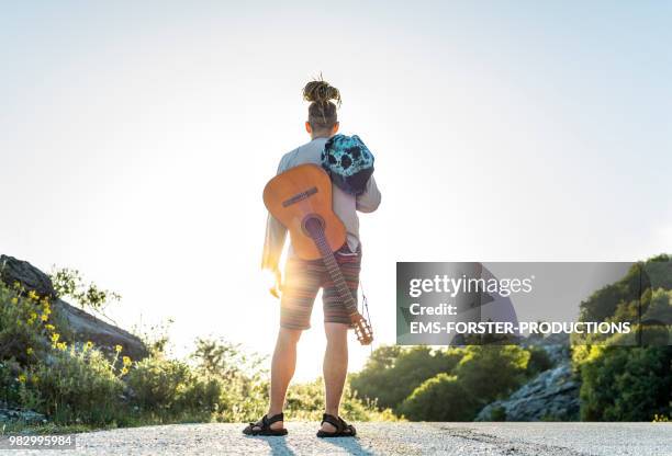 man in his twenties with long blonde dreadlocks - ems forster productions stock pictures, royalty-free photos & images