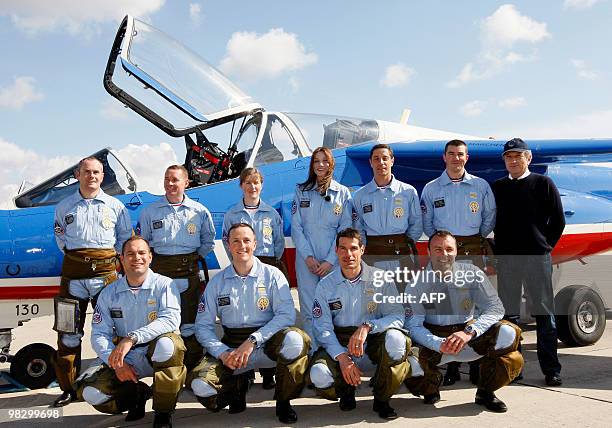 France's first lady Carla Bruni-Sarkozy , patron of the French aerobatic squadron "Patrouille de France" poses with pilots after an exhibition in...