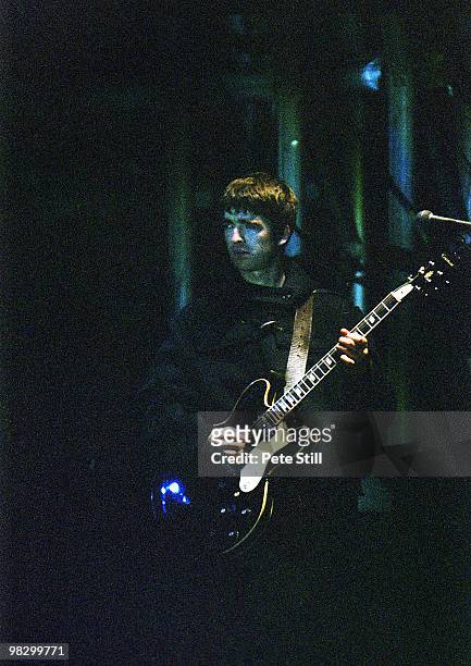 Noel Gallagher of Oasis performs on stage at the Glastonbury Festival on June 23th, 1995 in Somerset, England.