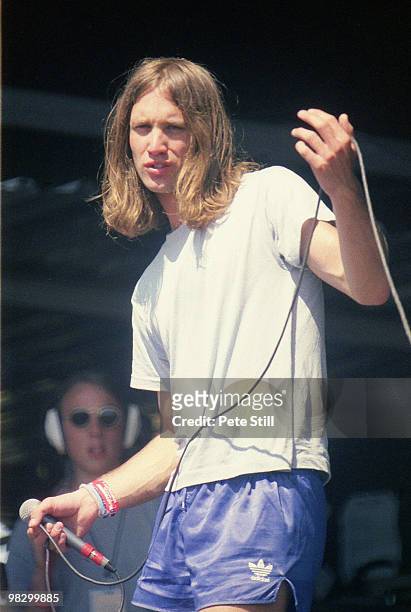 Gary Stringer of Reef performs on stage at the Glastonbury Festival on June 23th, 1995 in Somerset, England.