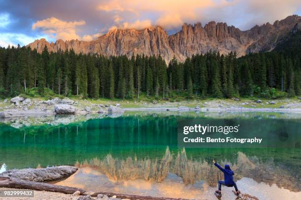 lake carezza, dolomite, italy. - latemar mountain range stock pictures, royalty-free photos & images