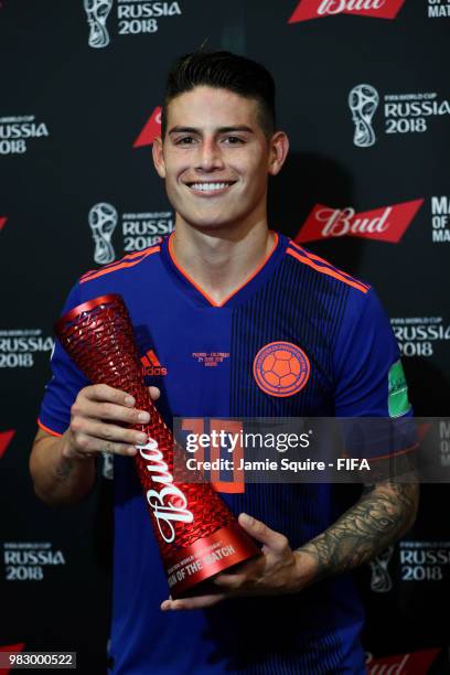 James Rodriguez of Colombia poses with the Man of the match award after the 2018 FIFA World Cup Russia group H match between Poland and Colombia at...