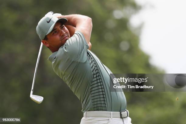 Jason Day of Australia plays his shot from the fifth tee during the final round of the Travelers Championship at TPC River Highlands on June 24, 2018...