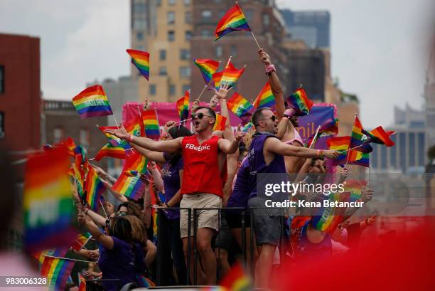 Revellers take part in the annual Pride Parade on June 24, 2018 in New York City. The first gay pride parade in the U.S. Was held in Central Park on...