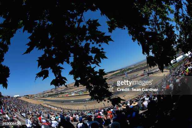 Cars race during the Monster Energy NASCAR Cup Series Toyota/Save Mart 350 at Sonoma Raceway on June 24, 2018 in Sonoma, California.