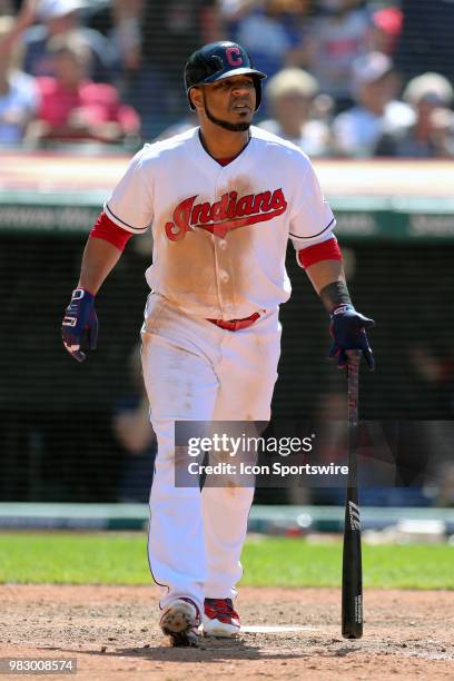 Cleveland Indians designated hitter Edwin Encarnacion watches the ball clear the wall as he hit a grand slam during the eight inning of the Major...