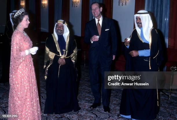 Queen Elizabeth ll and Prince Philip, Duke of Edinburgh meet the Amir of Bahrain during a visit to the Gulf States on February 9, 1979 in Bahrain,...