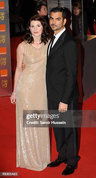 Actress Jodie Whittaker and guest arrive at the Orange British Academy Film Awards 2010 at the Royal Opera House on February 21, 2010 in London,...