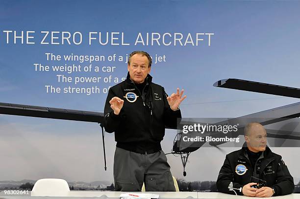 Andre Borschberg, left, and Bertrand Piccard, co-founders of the Solar Impulse solar-powered airplane project, hold a news conference prior to the...