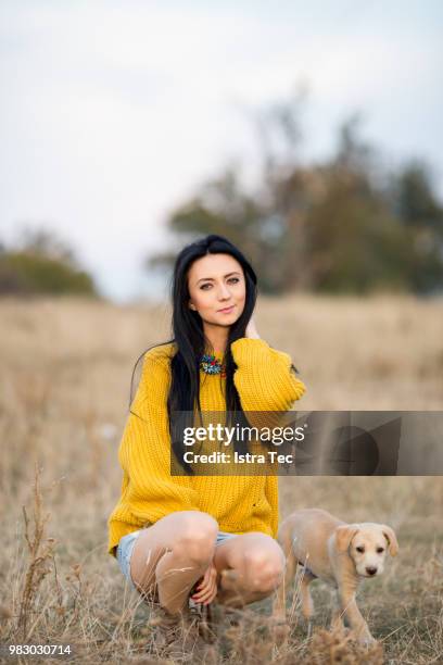 labrador puppy and girl - tec stock pictures, royalty-free photos & images