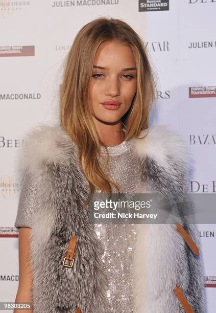 Rosie Huntington-Whiteley attends the Love Ball London hosted by Natalia Vodianova and Harper's Bazaar as part of London Fashion Week Autumn/Winter...