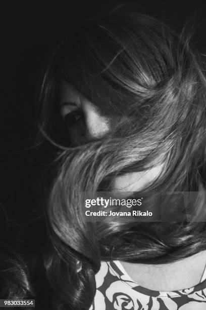 wind in woman's hair - jovanat stock pictures, royalty-free photos & images