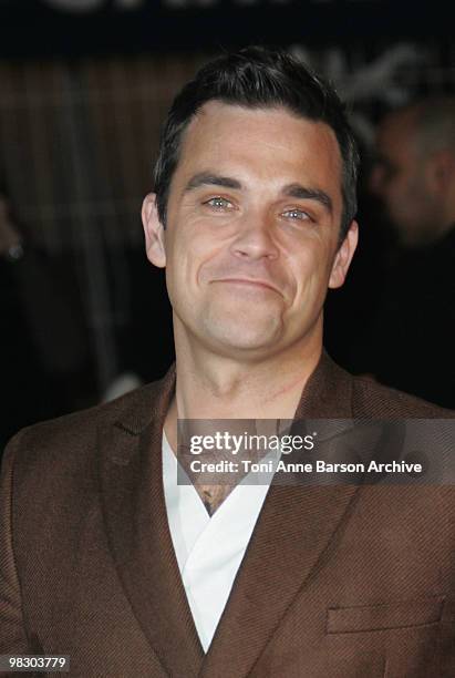 Robbie Williams arrives at NRJ Music Awards at the Palais des Festivals on January 23, 2010 in Cannes, France.