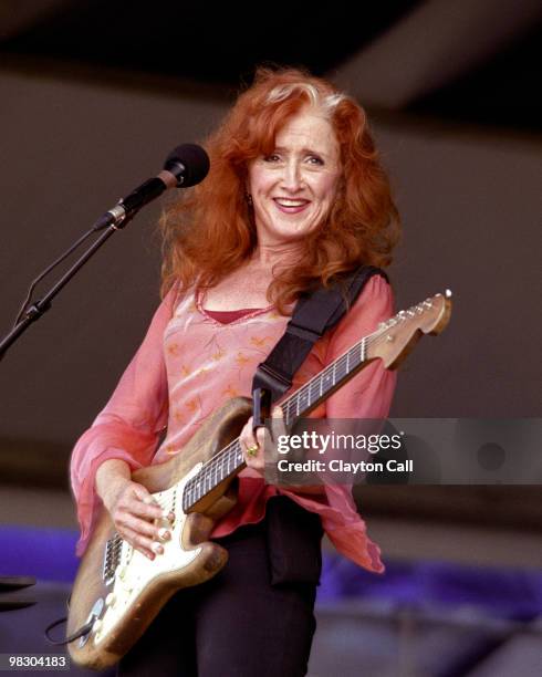 Bonnie Raitt performing with fender stratocaster at the New Orleans Jazz & Heritage Festival on May 03 2002