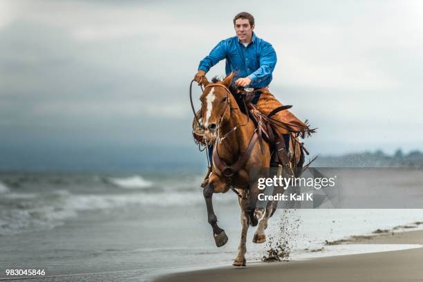 free spirits - man riding horse stock-fotos und bilder