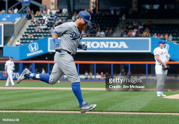 Justin Turner of the Los Angeles Dodgers runs the bases after his eleventh inning home run against Chris Flexen of the New York Mets at Citi Field on...