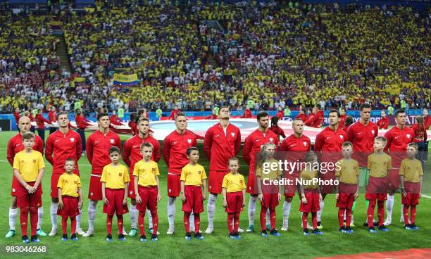 Poland's players sing their national anthem before the Russia 2018 World Cup Group H football match between Poland and Colombia at the Kazan Arena in...
