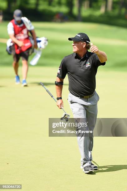 Scott McCarron walks to the 18rth green during the third and final round of the American Family Championship at University Ridge Golf Course on June...