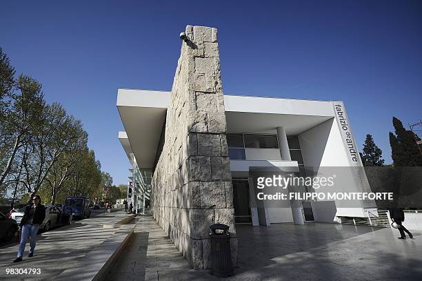 People walk by the Ara Pacis museum on April 7, 2010 in Rome. Rome's mayor Gianni Alemanno, who called the building in 2006 "a scar in the heart of...