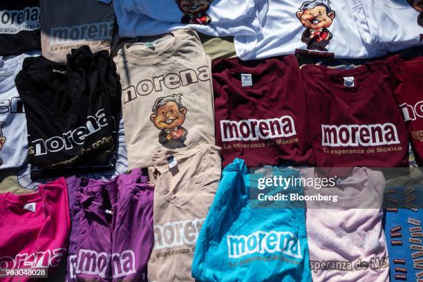 Campaign t-shirts sit on display for sale during the closing campaign rally of Andres Manuel Lopez Obrador, presidential candidate of the National...